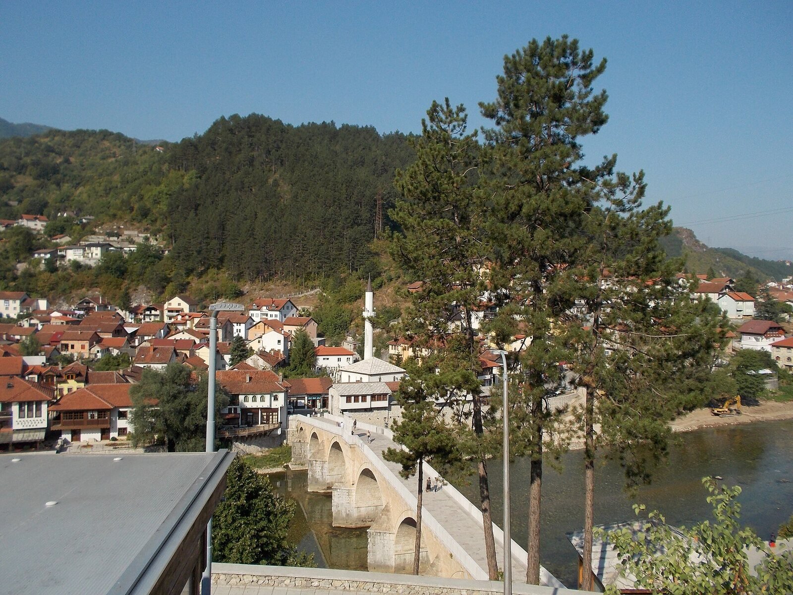 Konjic · Riverside rooftops and the old bridge